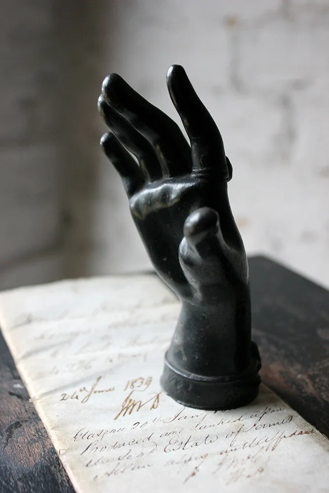 A Good Quality Victorian Dark Patinated Cast Iron Paperweight in the Form of a Ladies Hand c.1870-80